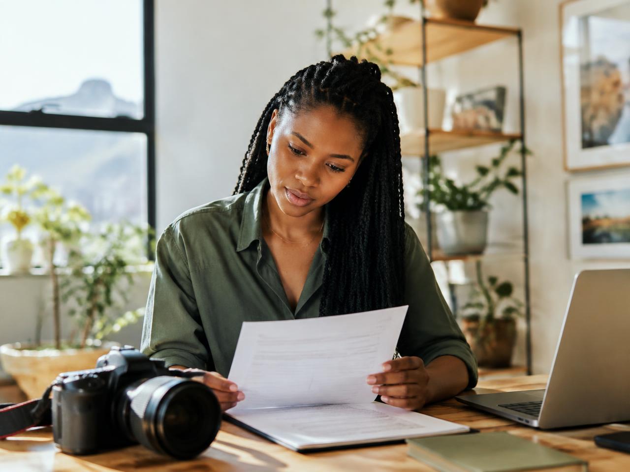 A South African photographer reading her contract